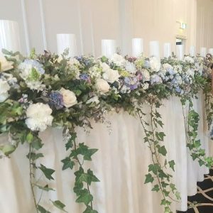 "bridal table edging flowers"