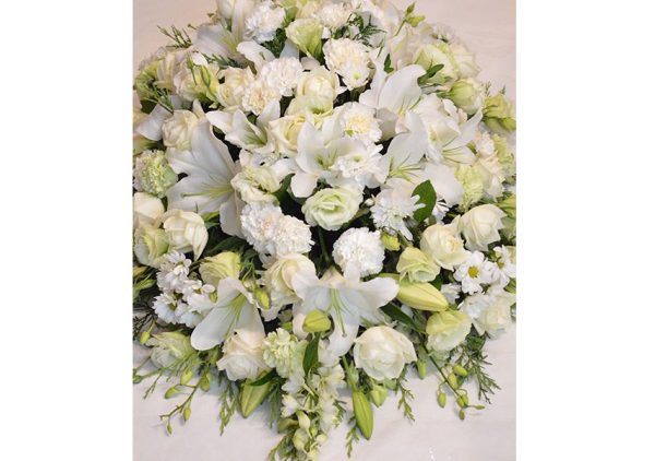"funeral posy pad flowers arrangement"